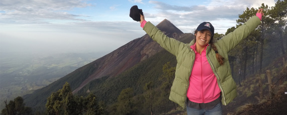 Student standing next to Volcano Acatenango, Guatemala